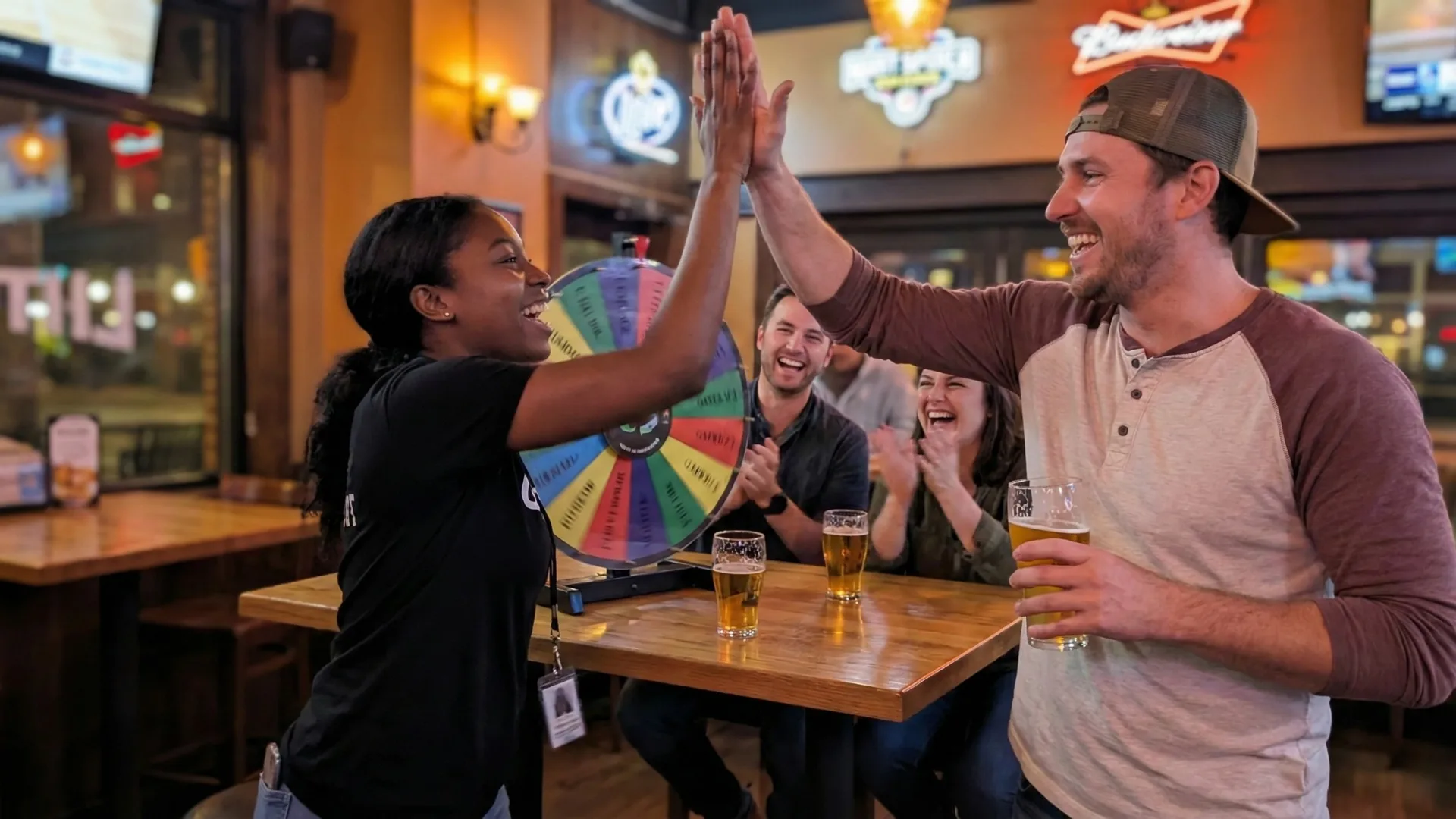 Ambassador high-fiving a customer at a partner bar during an activation event